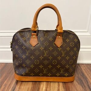 Louis Vuitton Alma Monogram Handbag